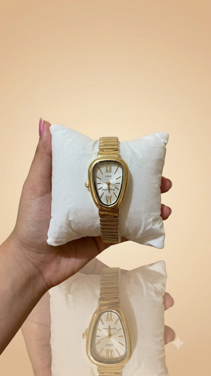 Montre dorée boitier goutte cadran soleil _ Darb Shop