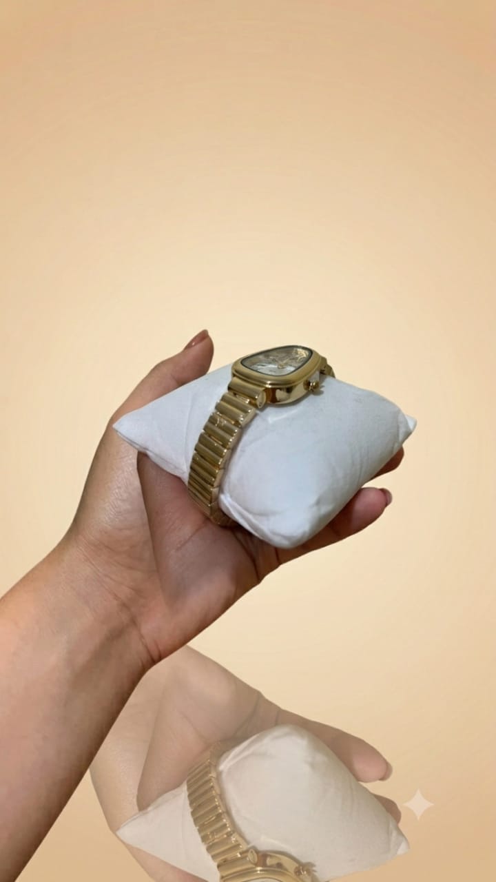 Montre dorée boitier goutte cadran soleil _ Darb Shop